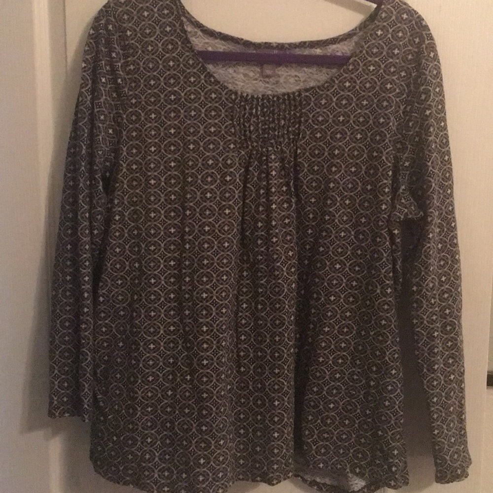 3/4 sleeve t-shirt in multicolored print.